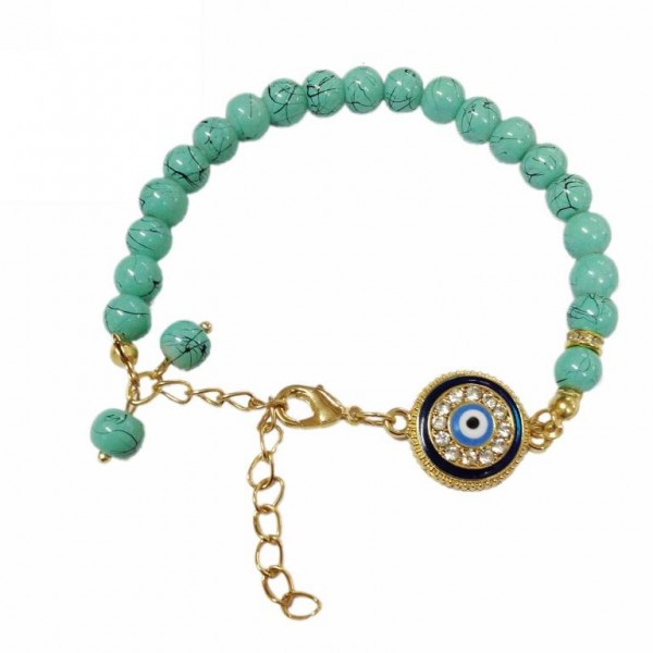 Bracelet with metal elements and turquoise coloraed pearls