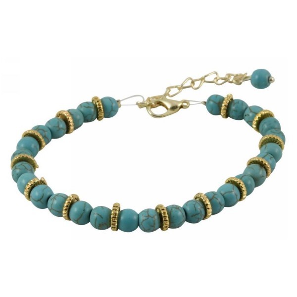 Bracelet with metal elements and turquoise colored pearls